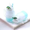 Кремовая чашка с молоком крем для миниатюрной бутылки для брелок для брелок моды моды мода в канатной подвесной подвеска