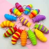 DHL Party Finger Slug Snail Caterpillar Schlüsselanhänger Stress abbauen Anti-Angst-Schlüsselanhänger Squeeze Sensory Toys B1006