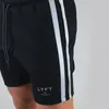 Sidor randig andningsbar springa shorts män snabb torr träning kroppsbyggande gym sport jogging pocket träning 220715