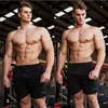 Мужские спортивные залы Fitness Loose Shorts Bodybuilding Joggers Summer Dry Dry Cool Short Pants Мужское повседневное пляжное бренд 220714