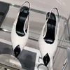 Spitze schwarze High Heels Damen 2022 Frühjahr neue sexy flache Mund-Metallkopf-dünne Fersen-Rückfahrt mit Baotou-Sandalen