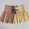 Abiti da ragazza Vestito estivo da neonata Manicotto da bambina per bambina Solid Ruffles Abito estivo senza maniche Abito in cotone di lino Abiti da festa a trapezio Gi da ragazza