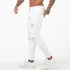 Jeans pour hommes GINGTTO blanc hommes taille haute déchiré maigre serré mâle Super pulvérisation sur pantalon goutte grande taille 36 Zm55
