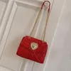 Sacs de soirée rouge / rose élégante dame perle-coeur matelassé chaîne épaule femmes Designer marque solide grande capacité sacs à rabat en cuir souple