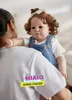 60cmの巨大なサイズのマディの赤ちゃんリボーン幼児の少女人形が根付いた茶色の髪の柔らかい抱擁ボディ高品質220505