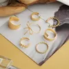 7pcs / set boho guld bred knädring uppsättning för kvinnor vintage geometrisk stor båge knut stjärna metall finger ring trend smycken gåvor