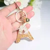 Modeguldf￤rg A-Z Initialer Nyckelring med Bell Glitter 26 Engelska bokst￤ver Pendant Keychains