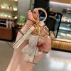 Leuke handgemaakte sieraden doe-het-zelf cartoon strass beren sleutelhanger kristal bomgom beer sleutelhanger sleutelhanger tas charme hanger accessoires 153342156