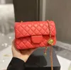 Luxe ontwerpers van dames schoudertassen mode textuur gouden schouderketen crossbody tas multifunctionele grote capaciteit envelop pakket fabrieksafgerechtende verkoop