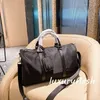 Borsa da viaggio fitness in nylon Designer Fashion Black Canvas di alta qualità Borsa da uomo stile marea europea e americana W323c