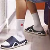 Men's and women's pure cotton socks love embroidery human made middle and high tube sports stocking