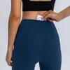 135 Leggings sportivi Pantaloni da yoga da donna con tasche Vita alta Allenamento femminile Abiti da fitness nudi Collant da palestra Pantaloni sportivi elasticizzati1917658