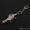 12cmミニガンキーチェーンライフルAKMモデルキーチェーンAK 47おもちゃ銃キーチェーンアクセサリーゲームファンのための学校バグペンダントフレンドギフトキーリングキーリング