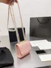 2022 Nya lyxiga crossbody axel designer väskor mini tr flap lady väska guld metall med kedjehandväska handväska liten rutig täcke rosa lammskinn topphandtag påse storlek 11 cm