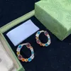 Orecchini di diamanti pendenti di lusso per donna Orecchini in materiale d'ottone Stile di moda Prodotti classici Fornitura personalizzata della migliore qualità