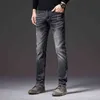 Slim Marque Jeans Hommes Petits Pieds Trous Légers Tube Droit Automne et Hiver Élastique Mode Coréenne