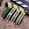 2022 Designer Keychain Key Chain Buckle Keychains Lovers Handmade Leather Brand Colorful Flowers Bee Snake Bag Pendant Fashion Acc2592038