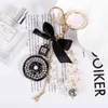 Fashion Imitation Pearl Perfume Bottle Keychain Car Key Ring Women Bag Charm Accessories Cute Bow Key Chain Creative Keyrings AA220318