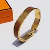 Designerarmband i rostfritt stål klassiska smyckesarmband för män och kvinnor