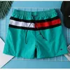 fashion mens stitching sports fitness training running casual shorts 5 points pants 220610