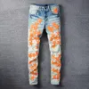 Pantalones vaqueros para hombre América hombre azul naranja estrella cuero Patchwork agujero reparación Streetwear Jean moda rasgado hombres motocicleta pantalón