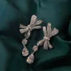 Biżuteria Kolczyki Urok Łuk Srebrny Kolczyk Dziewczyna Diament Imitacja Rubinowe Kolczyki - Wojenie Kolczyki