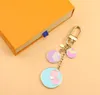 Luxurys Designers Keychain Classic Brand Key Buckle Flower Letter Key Chain Bag Ring Handmade Keychains High Quality Men Women Bags Pendant Multiple Colour