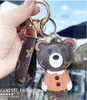 Djurnyckelkedjor ringer tillbehör Flower Lion Tiger Monkey Bear Pu Leather Car Keychains Buckle Fashion Jewelry Gift Bag Charms Pendant Keyring Holder