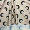 22SS Summer Designer Womens T قمصان أعلى ملابس أنثوية مثيرة القمر طباعة مصمم مصمم نساء طويل الأكمام الرسم Tee Tunics Koszulka Damska Crescent Wholesale SM