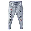 Горячие мужские джинсовые джинсы мода печать личности разорванные отверстия патч Trend Trend Spirit Guy промытые тонкие ноги подростки обрезанные брюки