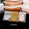 Small 2.5x3 CM 100 Pcs/Lot Patterned Packaging Bags Mini Clear Resealable PE plastic packing bags Self sealed poly pouch wholesale