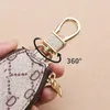 Autoschlüssel Tasche Schlüsselanhänger Ringe Braune Blume Plaid PU-Leder Gold Metall Schlüsselanhänger Halter Anhänger Charms Modedesign Beutel Jewelr2078