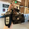 Plaid Leather Key Chains Ring Jewelry Brown Tassel Wireless Bluetooth Headphone Case Car Keyrings Holder Fashion Keychains Accessories Cute