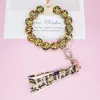 Bracelets de perles en bois imprimé léopard porte-clés bijoux faits à la main en cuir gland bracelet pendentif mode bracelet bracelets titulaire anneau de poignet