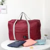 Vêtements Armoire Stockage 2022 Nylon Sacs de voyage pliable de nylon Unisexe Grand sac à bagages étanches Sacs à main ultra-légers