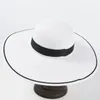 Breda randen hattar sol för kvinnor flickor disketten stråhatt hepburn stil svart vit sömmar sommar anti-uv strandkapsel chapeaubrom