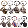 9 couleurs en cuir glands bracelets porte-clés bracelet écouteur sac sac de maquillage avec miroir porte-clés Bluetooth casque boîte de rangement Stock