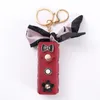 Designer Letter Key Chains Rings Silk Scarf Lipstick Keychains Accessories Fashion PU Leather Flower Pendant Charm Car Keyrings Holder Women Mini Bag Trinket Gifts