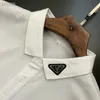 デザイナーポロメンカジュアルビジネスシャツコットンショートスリーブTシャツ大型サイズ黒と白のメンズポロファッションセータージャケットコート