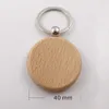 キーチェーン20pcs空白の丸い木製キーチェーンdiyキータグgiftkeychains