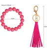 2022 New Fashion Solid Color Wooden Bead Keychain With Dark Wood Discs Leather Tassels