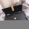 Pelle di lusso modello coccodrillo argento / oro frangia fibbia borsa a tracolla da donna messenger catena con patta 220718
