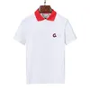 2022 Sommarkläder lyxig designer kort ärm polo skjortor män avslappnad polo mode orm bin tryck broderi t shirt high street mens polos size m-3xl