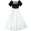 Лето с коротким рукавом круглое платье с шеей белые черные цветные цветные панели с элегантными повседневными платьями 22L025027