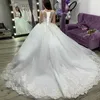 2022 New Dubai Elegant Long Ball Gown Wedding Dresses Sheer Crew Neck Lace Appliques Beaded Vestios De Novia Bridal Gowns with Buttons
