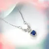 Pendentif Colliers En Gros 10 Classique Océan Coeur Volant Aigle Bleu Zircon Collier Cristal De Mode Simple Dames BijouxPendentif