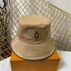 Designers seau chapeau couleur unie lettre broderie chapeaux de soleil mode casual couple casquettes tempérament cent voyage bord de mer chapeau de plage très agréable