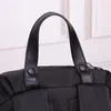 Mochila de lona impermeable de diseñador, bolsas de negocios, mochila para computadora portátil, bolsa de asas de tela de paracaídas, bolsos de lujo unisex para hombres, mochila escolar espacial de gran capacidad