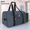 2023 designers mode duffel väskor lyxiga män kvinnliga resväskor läder handväskor stor kapacitet håll i bagage över natten veckor väska med lås 099#