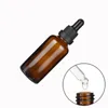 Emballage Bouteille en verre brun Épaule ronde Grand collier de tête Colle flexible noire Flacons compte-gouttes d'huile Récipient cosmétique rechargeable 5 ml 10 ml 15 ml 20 ml 30 ml 50 ml 100 ml